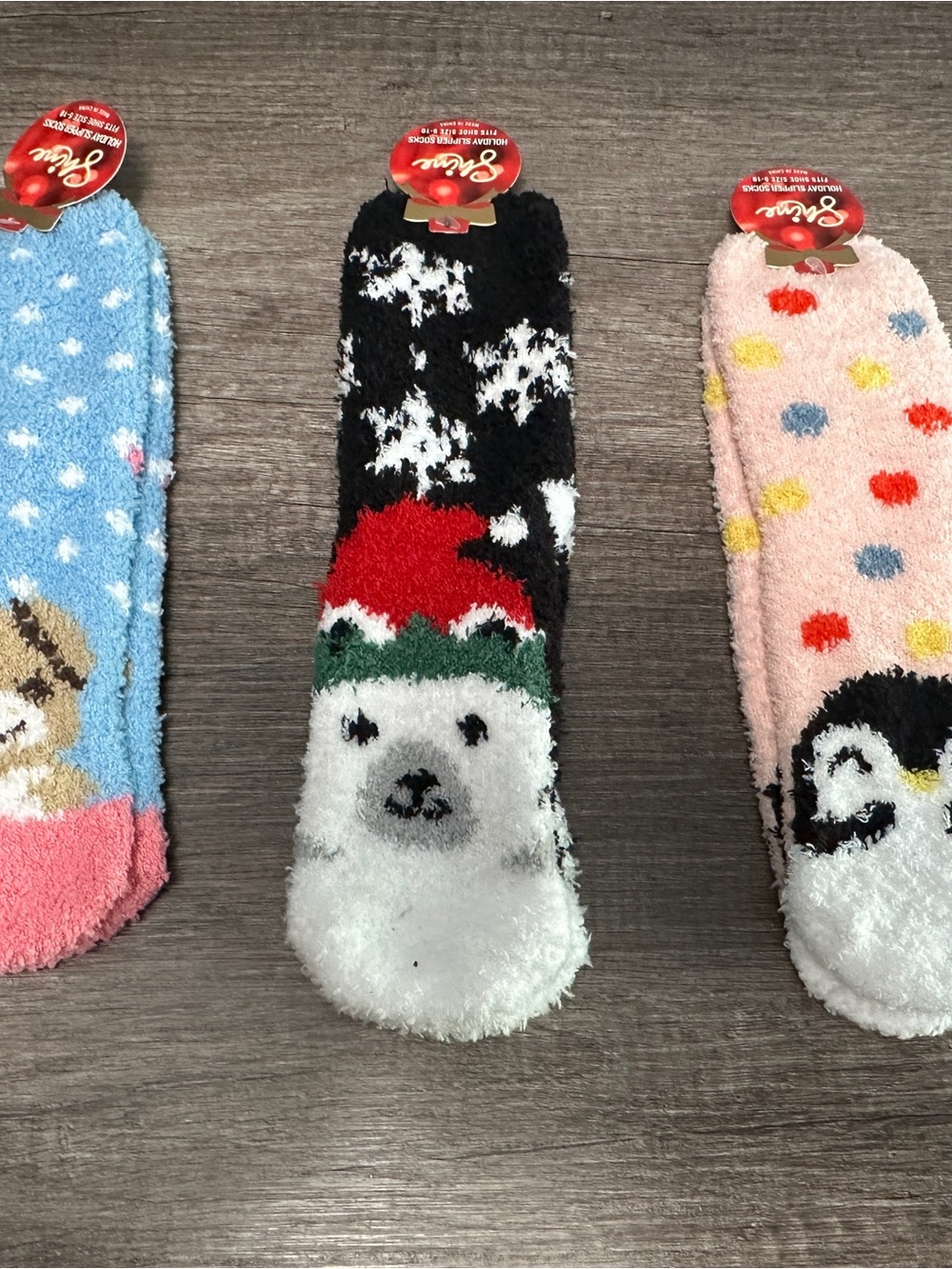 3 pairs of Christmas socks with penguin, polar bear, and dog designs
